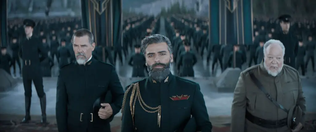 Gurney Halleck (Josh Brolin). Duke Leto (Oscar Isaac), and Thufir Hawat (Stephen McKinley Henderson) receive the Imperial delegation in Denis Villeneuve's 'Dune: Part One' movie. 