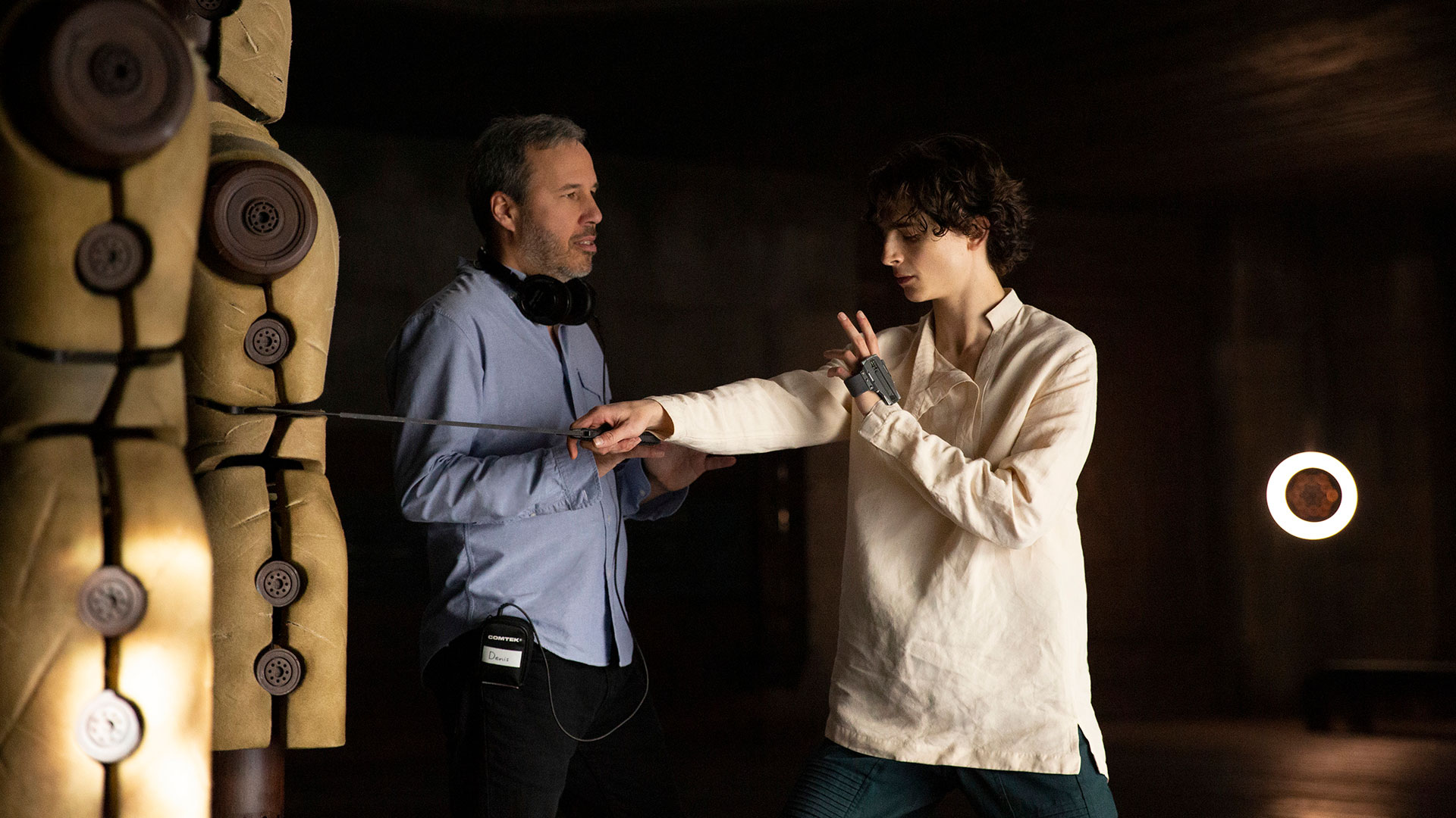 Denis Villeneuve and Timothée Chalamet in the Caladan training room, during the film of 'Dune'.