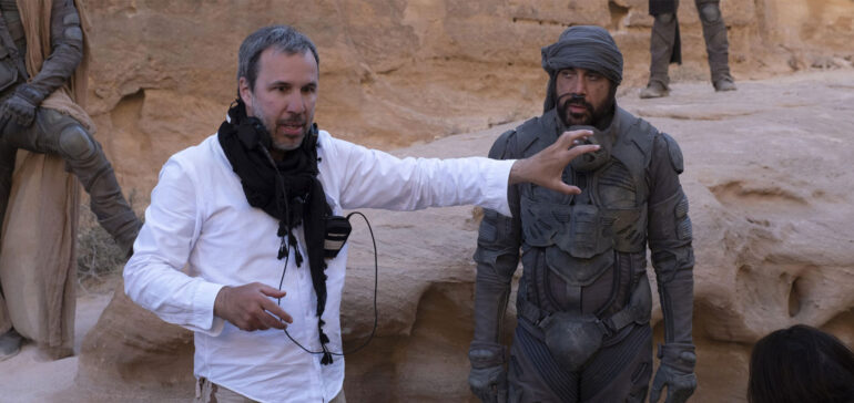 Denis Villeneuve and Javier Bardem on the set of Dune (2021). Part of the movie was filmed in the deserts of Wadi Rum, Jordan.