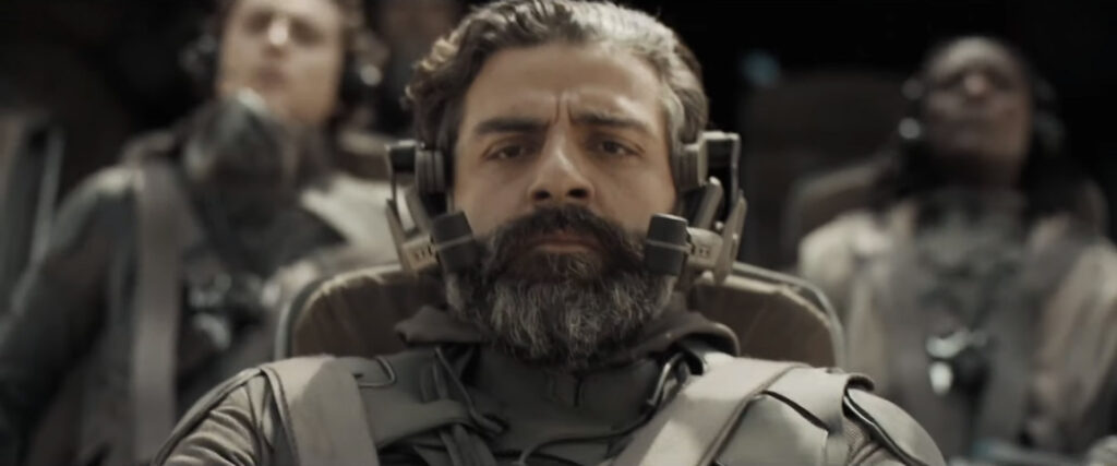 Duke Leto Atreides (Oscar Isaac) piloting an ornithopter, during the spice harvester scene, in Denis Villeneuve's 'Dune: Part One' movie (2021).