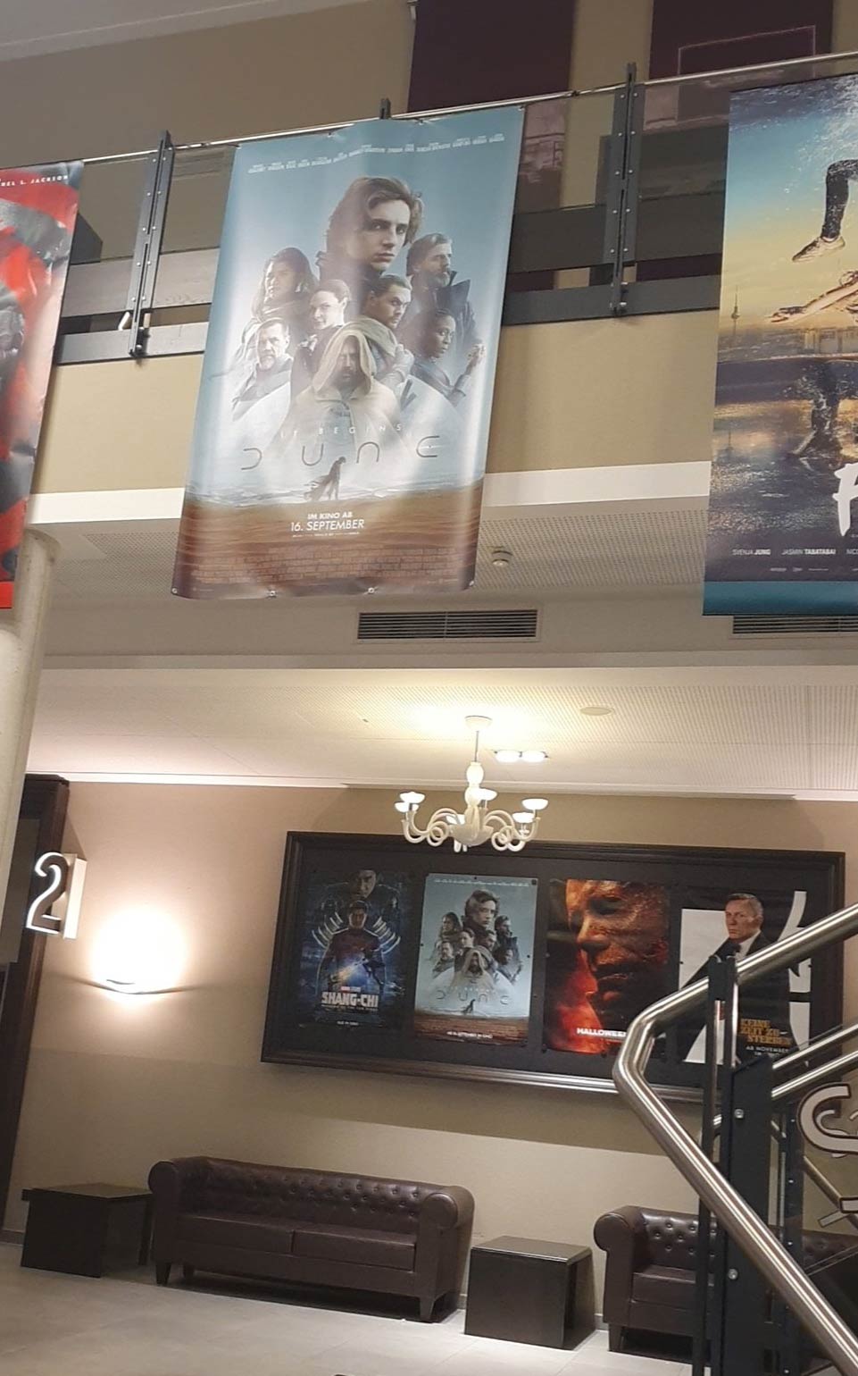 Banners and posters promoting the Dune movie, inside of a cinema in Germany.