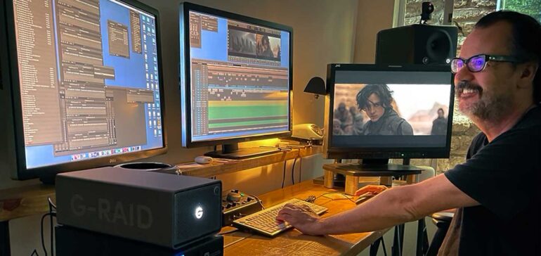 Photo of Joe Walker in his home studio, editing the 'Dune: Part One' movie.