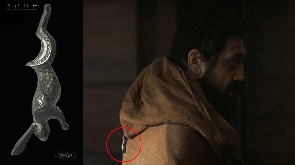 Detail from 'Dune: Part One' movie: A Fremen "Hare pendant" holds down Stilgar's hood. 