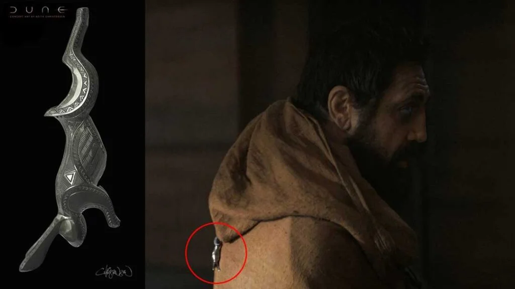 Detail from 'Dune: Part One' movie: A Fremen "Hare pendant" holds down Stilgar's hood.