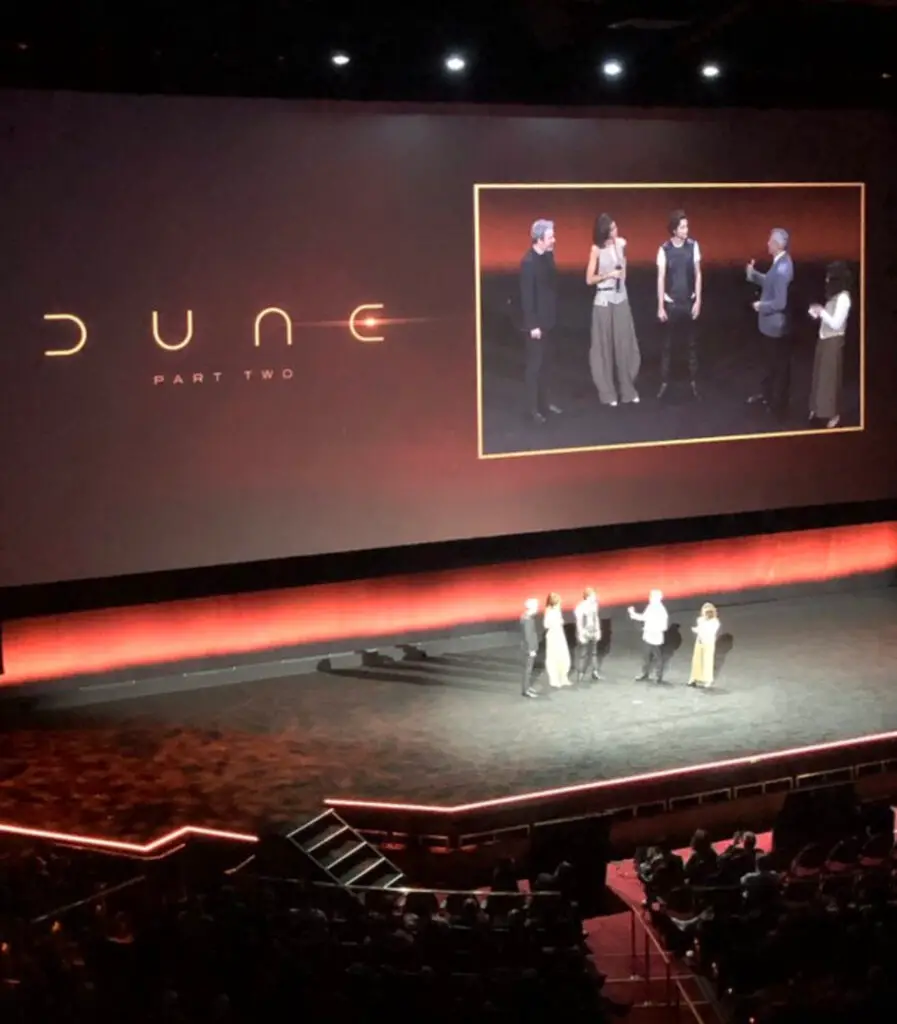 'Dune: Part Two' movie is presented at CinemaCon 2023, with Denis Villeneuve, Zendaya, and Timothée Chalamet on stage.