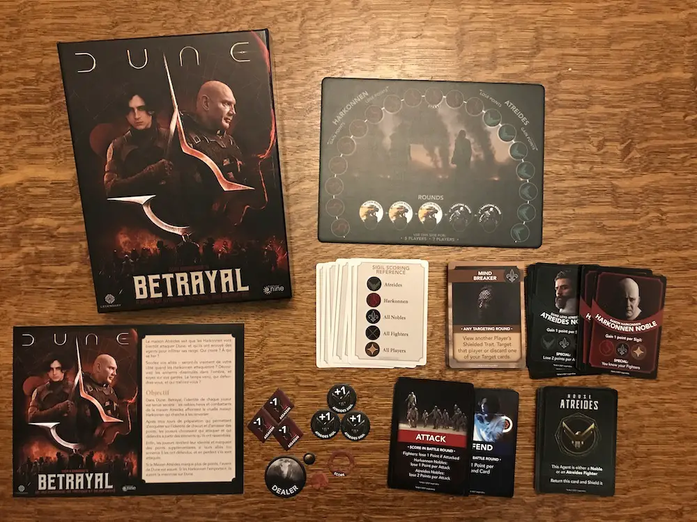 Contents of the the 'Dune: Betrayal' card game, including card decks, tokens, and game play tracker.