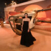 Souheila Yacoub at the 'Dune: Part Two' premiere in London, posing in from of an ornithopter.