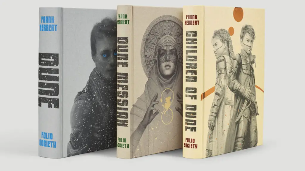 The Folio Society collector's editions of 'Dune', 'Dune Messiah', and 'Children of Dune' books by Frank Herbert, pictured side-by-side.