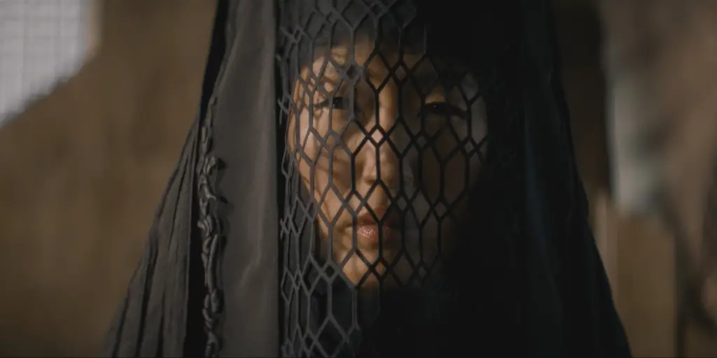 Close-up of Reverent Mother Kasha, played by Jihae, in the 'Dune: Prophecy' TV series.