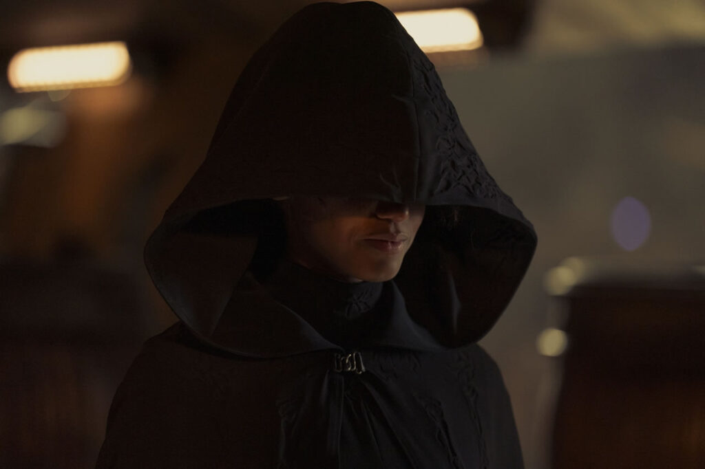 Close-up on a hooded Mikaela (Shalom Brune-Franklin) in the 'Dune: Prophecy' TV series.