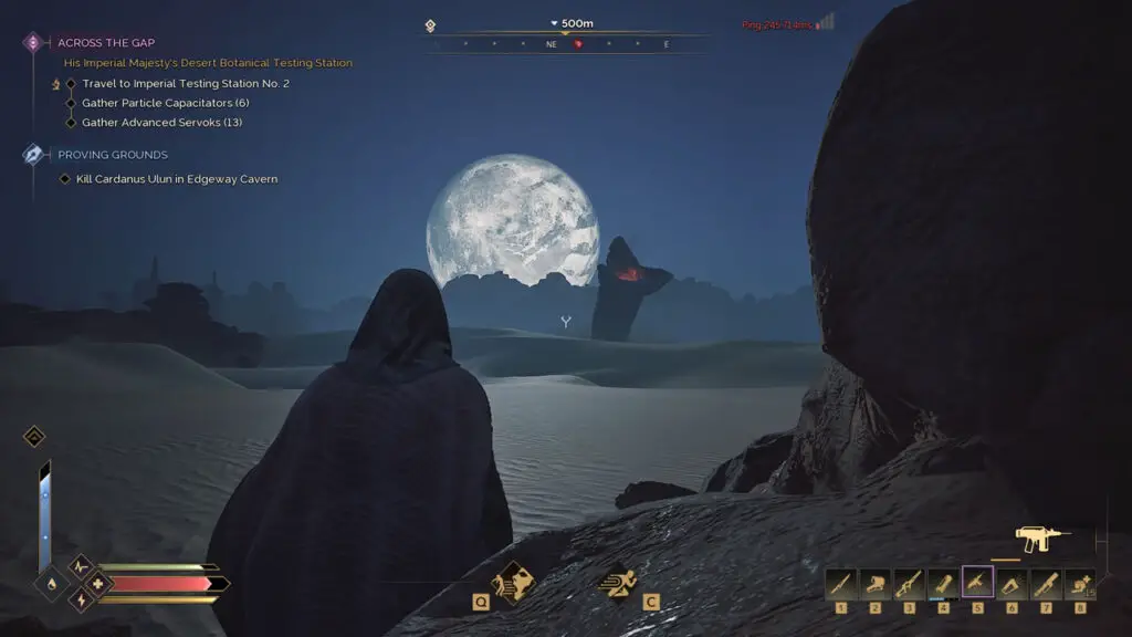 A cloaked figure observes a sandworm in 'Dune: Awakening', Funcom's open world MMO game set on Arrakis.