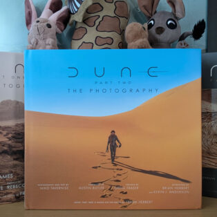 Review copy of 'Dune Part Two: The Photography', pictured next to other behind-the-scenes 'Dune' books from Insight Editions.
