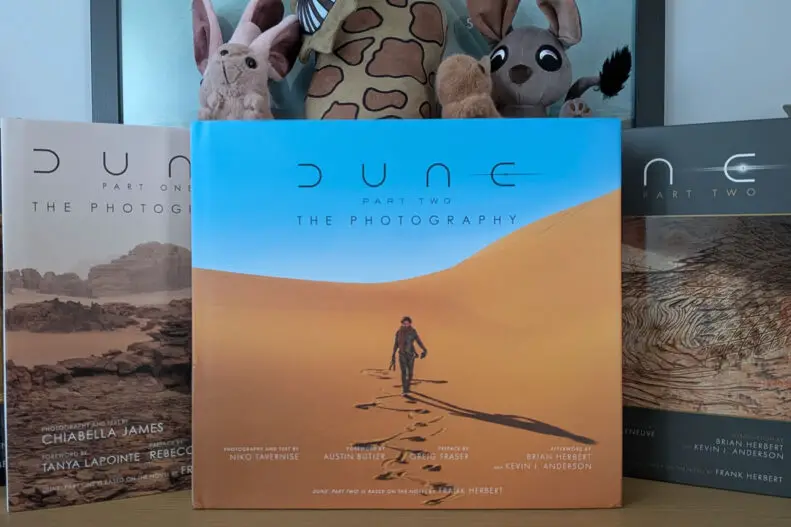 Review copy of 'Dune Part Two: The Photography', pictured next to other behind-the-scenes 'Dune' books from Insight Editions.
